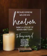 Click on the following link to browse HUNDREDS more designs in our shop!! https://pinkposiesandpearls.etsy.com/  Because Someone We Love In In Heaven There's A Little Bit Of Heaven In Our Home Forever In Our Hearts Memorial Acrylic Wedding Sign                                          | Welcome to Pink Posies and Pearls Wedding and Gift Boutique | | THE PRODUCT | *We love the clean lines of this acrylic In Loving Memory sign. We can print these signs in ANY color! Choose a color from the swatches image or let us know your custom color you would like printed (all but metallics). We offer clear stands. *.    This acrylic is a display material that is strong, moisture resistant & visually clearer than glass, not to mention shatterproof! *.    Need this in different wording? No problem! Put yo