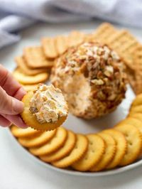 This Classic Cheese Ball recipe makes the perfect party appetizer. A cheese ball made with cheddar cheese, cream cheese, green onion and spices, and coated in chopped pecans.