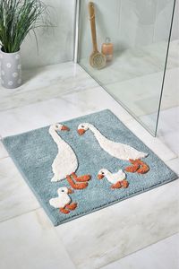 Brighten up your bathroom with this adorable Goose and friends runner bath mat. Its charming design will add a touch of character to your space, while also providing comfort and safety with its non-slip surface. 100% Cotton.