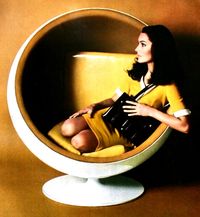 Jardin des Modes December 1968 Chair by Roche et Bobois, handbag by Dofan