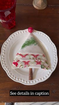 See full details to create a Christmas Tree Napkin Fold