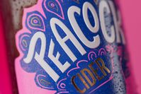 Kingdom & Sparrow rebrand helps Peacock Cider strut into a new era | Creative Boom