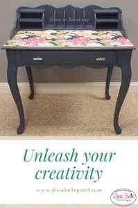 This Yankee Blue writing desk topped with wallpaper is a statement piece for sure! Shop Dixie Belle Paint today! #dixiebellepaint #bestpaintonplanetearth #chalklife #homedecor #doityourself #diy #chalkmineralpaint #chalkpainted #easypeasypaint #makingoldnew #whybuynew #justpainting #paintedfurniture #blue #bluefurniture #yankeeblue