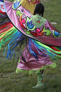 Female Native American, dancing the "Shawl Dance." Great work on the costume, also.