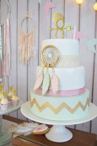 pastel-boho-chic-party-cake-with-gold-dipped-feathers