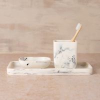 Our merle flow resin bathroom caddy/tray is distinctive and organic with its curved lines and marble finish. each piece is handmade and no two patterns are the same. Details• designed in Australia• made in India• hand wash in warm water