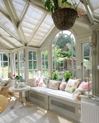 This beautiful conservatory features our bespoke pinoleum blinds offering a filtered shade while still providing a level of protection from the sun and UV rays  Pinoleum blinds are truly spectacular when paired with a traditional timber framed conservatory; creating a classic finish.