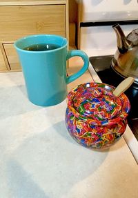 Adorn your kitchen countertop, coffee station or party table with the Rainbow Sprinkles Sugar Bowl. The perfect petite size jar to keep your sugar ready at a moments notice but still big enough to hold 8oz of your favorite sweet additive. Fill it with sprinkles and put it on display at an ice cream sundae making bar! The perfect addition to sprinkle some fun color and happiness to any party treats tables or daily decor. Each sprinkle creation can be customized with a selection of colors to help personalize it for an even more thoughtful gift for everyone special in your life!