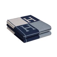 Guaranteed authentic Hermes Avalon blanket featured in Blue Caban / Ecru Created from 90% Merino Wool and 10% cashmere and has whip stitch edges.New or Pristine Store Fresh Condition. final saleBLANKET MEASURES:51.2" x 66.9"CONDITION:New or Pristine Store Fresh Condition