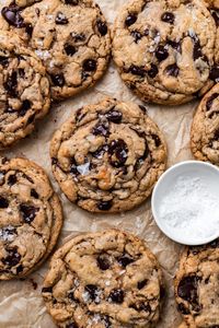 These are the best vegan chocolate chip cookies you'll ever make!! Chewy edges and soft, molten middles studded with melty chocolate chips. Easy to make with ingredients you probably already have, absolutely no one will know these cookies are vegan, no dairy and no eggs thanks to our secret and simple ingredient!