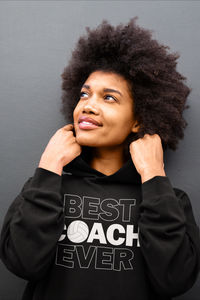 A sweet hoodie for the world's best volleyball coaches, with BEST COACH EVER in bold white and black text and a volleyball graphic in place of the O