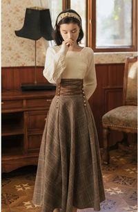 Indulge in the timeless and sophisticated style of Calling The Fog Dark Academia 2-piece set. Featuring a lace-up high waist skirt crafted from soft wool and a soft knitted sweater, this set will keep you warm during the colder months while elevating your look with its classic plaid pattern. Perfect for daydreaming in the cozy embrace of winter. Sweater One Size S/M/L Bust: 90-110cm Length: 53cm Skirt size S Waist: 62-68cm Length: 83cm Skirt size M Waist: 66-72cm Length: 84cm Skirt size L Waist: