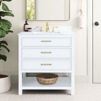 This space-saving 31" single bathroom vanity set provides ample storage for your guest bath or a half bath. Its freestanding frame is made from solid pine wood in the finish of your choice and is built on tapered legs. The crisp, white Carrara marble surface accommodates the included rectangular sink for the perfect coastal farmhouse look in your home. On the front, two wide drawers and a pull-down drawer with sleek, metal drawer pulls offer room for makeup, cleaning products, and other toiletri