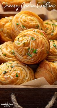 Cheesy Garlic Chive Cruffins are crescent-roll dough that is filled with cheesy chive garlic butter, rolled, cut, and baked in a muffin tin.