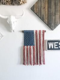 "Hang this beautiful rustic American flag style piece in your home! Great for the American holidays but also for a year round touch of rustic Americana! - Colors are a washed/faded red, white and blue - Regular flag is 26\" long x 18\" wide - $75 - Small flag is 17\" long x 11\" wide - $50 - Made with super soft 100% natural cotton 5mm string - Each piece is handmade so there are slight variations from the photo shown above. - Can be hung by sitting the dowel on two nails - Suggested indoor use