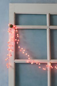 Add the ideal finish to any interior space with these so cool string lights featured in a snowberry-inspired silhouette for a truly timeless touch. * LED string lights * 100 LEDs * 1.8 meters long | Snowberry String Lights by Free People in Red