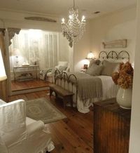 I love gray, white bedrooms... and absolutely love chandeliers in the bedroom! These floors are great too!