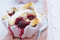 White chocolate & raspberry bread & butter puddings