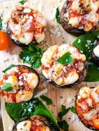 A simple and easy appetizer recipe, Lasagna Stuffed Mushrooms are stuffed with marinara sauce, ricotta, mozzarella, and Parmesan cheeses. A low carb, keto, vegetarian, gluten free Italian party recipe. #ketoappetizers #italianappetizers #stuffedmushrooms