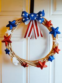 This year, I thought I’d try making patriotic home decor myself. This DIY 4th of July wreath was made with Dollar Tree craft supplies. #4thofJuly #DIY #wreath