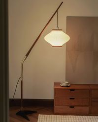 The Matsusu Floor Lamp by Dekorfine will add a serene yet sophisticated elegance to any living space. Its delicate, graceful shape perfectly complements a range of home decor styles, creating a timeless atmosphere. Perfect for creating a luxurious modern appeal in your home.