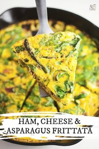 This Ham, Cheese and Asparagus Frittata recipe is healthy and easy to make! It's got veggies like spinach and asparagus, smoky ham, and cheese. This classic Italian egg dish is a great way to use up Christmas or Easter holiday ham or vegetables in your fridge. It's made in a cast iron skillet on the stove top and then baked in the oven. This gluten free dish is great for breakfast or dinner! #frittata #ham #asparagus #spinach #recipes #healthy #easy #baked #breakfast #glutenfree