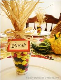 Use mini vases, corn husks and reeses pieces and you have adorable harvest corn placeholders