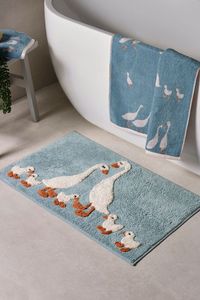 Brighten up your bathroom with this cute goose and friends bath/shower mat. Machine washable. 100% Cotton.