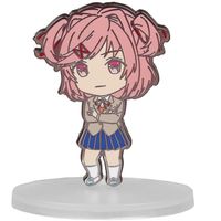 Your favorite character from Doki Doki Literature Club! is now a Nendoroid pin! This Doki Doki Literature Club! Natsuki Nendoroid Pin measures approximately 2 1/2-inches tall and comes packaged in a window box. Metal locking pin backs and a clear display stand are also included!