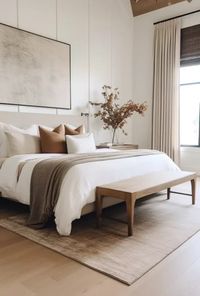 Looking for organic modern bedroom ideas? If the thought of a bedroom that exudes both simplicity and warmth, where clean lines meet earthy vibes, appeals to you, then you're likely a fan of the organic modern style. This aesthetic takes the best parts of minimalism — think uncluttered, airy spaces — and infuses them with a sense of comfort and livability. Picture this: plush, naturally-toned linens that invite you to dive in, sleek wooden furnit