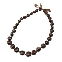 PRICES MAY VARY. Beautiful shiny solid dark brown real kukui nuts with ribbon tie. Wear as a lei or as a fashionable necklace. You can also double it around for a chunky beaded necklace look. More of a traditional type kukui nut lei, worn at weddings and during dance performances by men & women. 32" total length of nuts (does not include the ribbons you tie) Present this magnificent lei to a friend or loved one in the spirit of Aloha! The Kukui Nut with its unique shape, size and colors are hand-picked, hand -polished, and strung into a beautiful lei worn by Hawaiian Royalty, which symbolizes high honor and nobility. Present this magnificent lei to a friend or loved one in the spirit of Aloha!