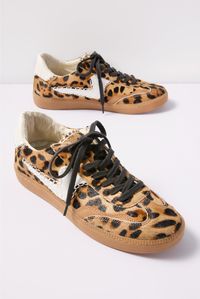 Make a stylish statement with these leopard pattern sneakers by Dolce Vita. Finished in genuine calf hair, the Notice Sneaker features a low-top silhouette, gum sole, and whipstitch detailing.