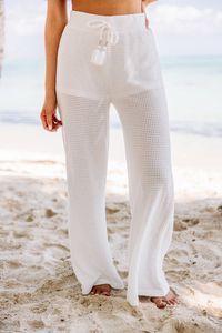 You are going to have some sunny days ahead! They are so chic and fabulous for pool days! The loose knit fabric is so light and airy which keeps them great for warmer weather. These knit pants are going to look so good over your swimmy! These pants features an elastic waistband with tied detail and loose knit fabric.