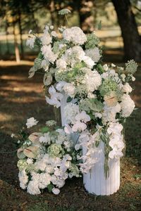 Wedding flowers. Reception pedestals. Fluted Pedestals.