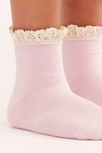 A classic with a twist, these so sweet waffle knit ankle socks feature a crochet lace ruffle at the top.