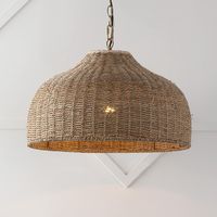 Our bohemian style pendant light will complement any coastal or cottage based decor in your home. Designed with an elegant rattan dome shade and classic metal chain, this light is perfect for a variety of spaces including dining rooms and kitchen islands. This pendant light is a great way to elevate your Mediterranean style home. JONATHAN Y Eliza 20" Rattan/Iron Coastal Bohemian Brown/Brass Gold Rustic Clear Glass Dome LED Medium Hanging Pendant Light | JYL1133A