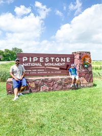 Pipestone National Monument in Minnesota is a hidden gem in the National Park System! Pipestone is beautiful and boasts one of the only tall grass parries left in the world. You can also visit one of the few waterfalls in Minnesota here! Our family absolutely loved our time visiting and exploring this park site. It's a great park to visit with kids! Check out our guide for how to spend a day at Pipestone National Monument! #pipestone #nationalpark #minnesota