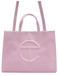 TELFAR SHOPPING BAG MEDIUM BUBBLEGUM PINK Please be aware that this product will be coming from the US, please allow up to 2 weeks for shipping.