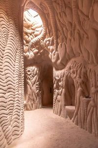 If you enjoy art, caves, or hidden destinations, you'll want to travel to New Mexico ASAP. The artist Ra Paulette sculpts incredible, immersive underground caves by hand and you can find around a dozen underneath local deserts. Sandstone shrines to nature, most are on private property but you can tour one gem at Origin of Northern New Mexico. It makes for a great day trip and you'll want to add this destination to your bucket list.