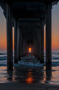 Scripps Pier in La Jolla, CA.  They say the sun only lines up like this twice per year, but I think they keep moving the pier so tourists can keep taking photos...