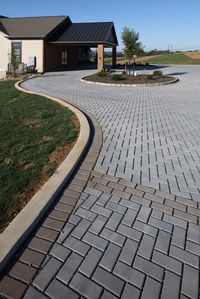 This interlocking concrete paver possessing strength and durability, brings a fresh new look to it’s traditional landscape brick predecessor.