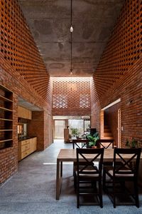 Perforated brickwork used to renovate house in Vietnam