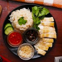 Hainanese Chicken Rice Recipe by Tasty. Sub another oil for sesame oil and coconut aminos for soy sauce