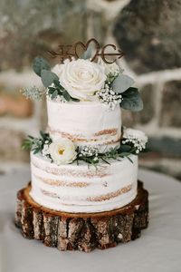 \"No matter what, their day was meant to be an intimate ceremony.\" The post Enchanting Poconos wedding surrounded by lush greenery and waterfalls appeared first on Equally Wed, modern LGBTQ+ weddings + LGBTQ-inclusive wedding pros. This photo features a simple, beautiful wedding cake.