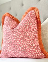 Indulge in luxurious comfort with our Pink Cheetah Chenille Throw Pillow Cover - a perfect blend of style and softness. The super-soft chenille fabric ensures a sumptuous touch, while the vibrant pink cheetah print adds a playful yet chic vibe. The eye-catching orange brush fringe provides exquisite detail, elevating the overall design with a touch of opulence in a dusty orange hue. Designed for modern interiors or those embracing chinoiserie style decor, this pillow cover effortlessly combines