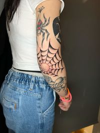 Web elbow tattoo