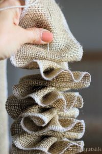 Pretty Burlap Garland Tutorial it would make a nice Christmas decoration and string some lights up with it