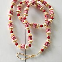 <p>Arrange our <strong>Cheerful Spool Garland, Set of 2,</strong> along a banister, mantel, door frame, or table to create a festive look for any display. This decorative garland is six feet long and made with alternating beads and candy-striped spools. Use this cheerful garland for an event, holiday party, or in a classroom setting.</p>