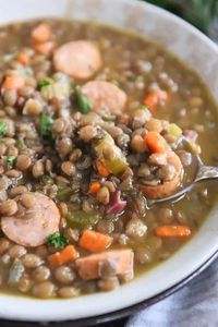 This leftover ham bone lentil soup is one of the tastiest soups we've ever had! So much flavor packed into one bowl. YUM! | melskitchencafe.com