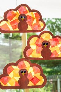 Need a quick and easy fall craft to keep the kids busy? This Turkey Suncatcher Craft is such an easy craft. Print off the turkey template provided, add tissue paper to contact paper and top with the turkey. These Thanksgiving suncatchers look so pretty hanging up in your windows!